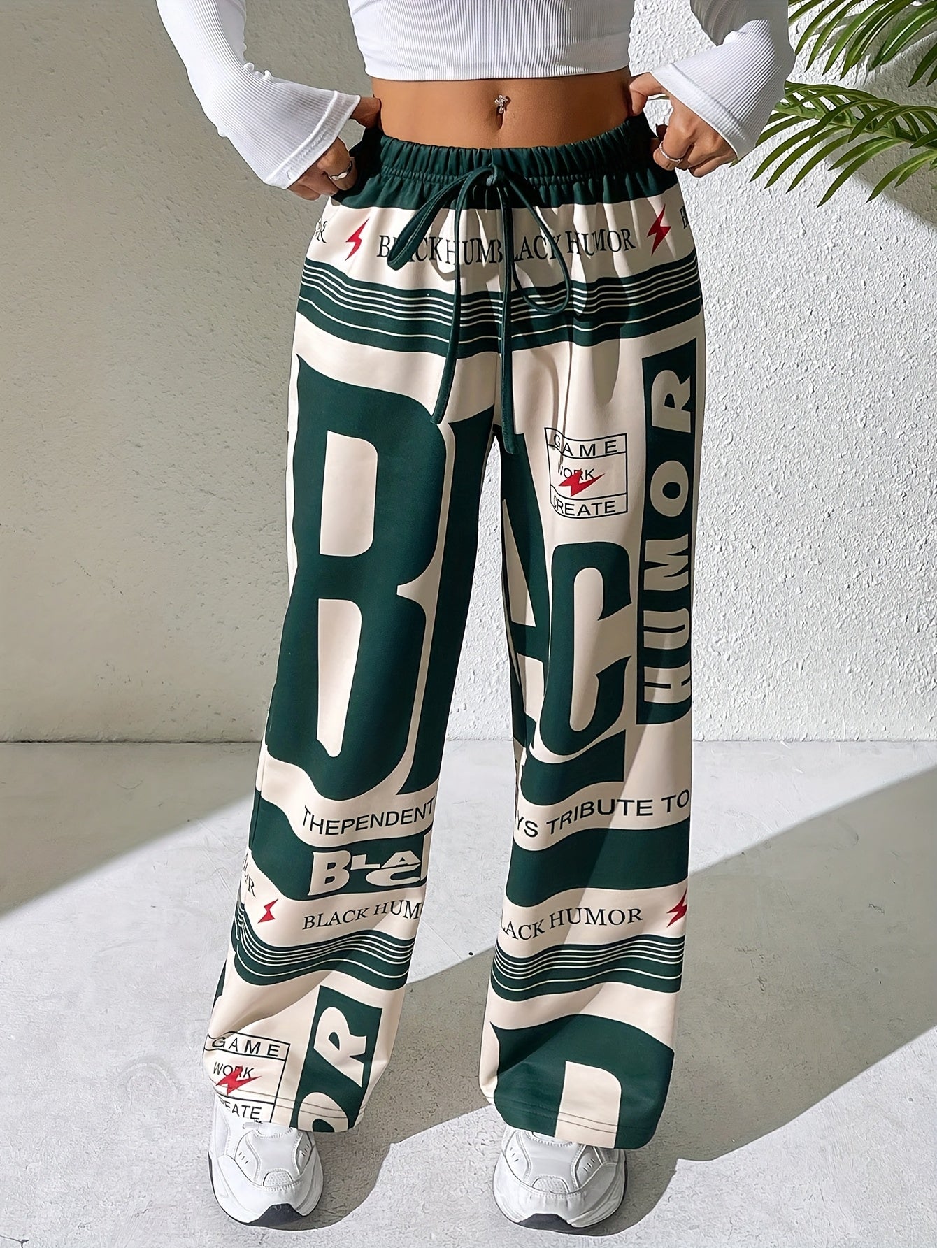 Pantalones de mujer con estampado de letras 'BLACK HUMOR'