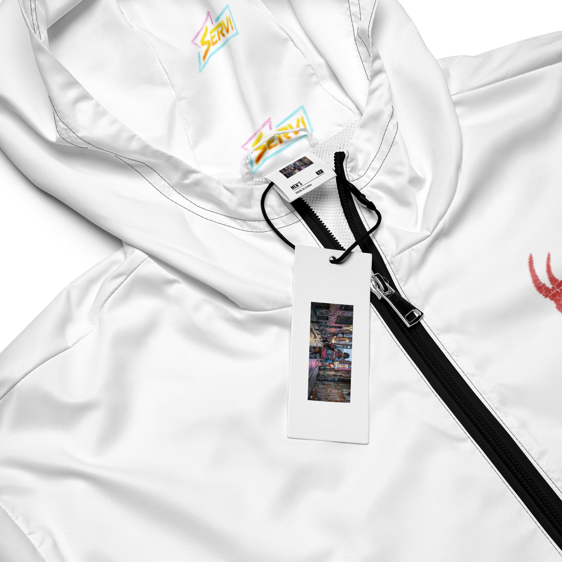 Cortavientos Servi Go navideño - detalles del producto y acabados
